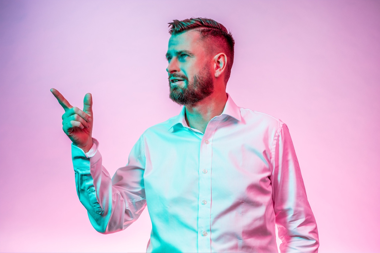 Man points to the left