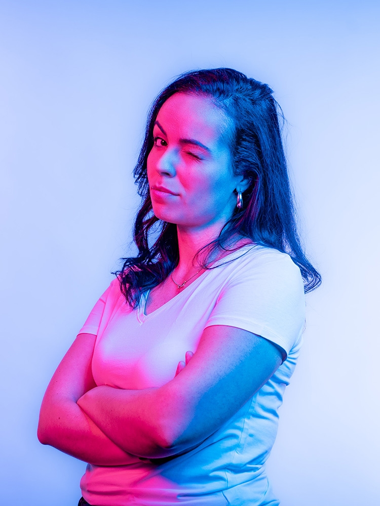 Woman winks with one eye