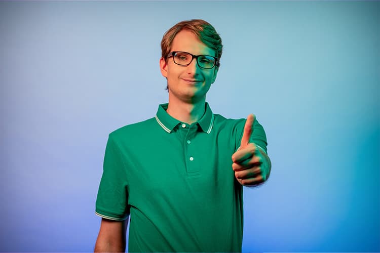 Man shows thumb up